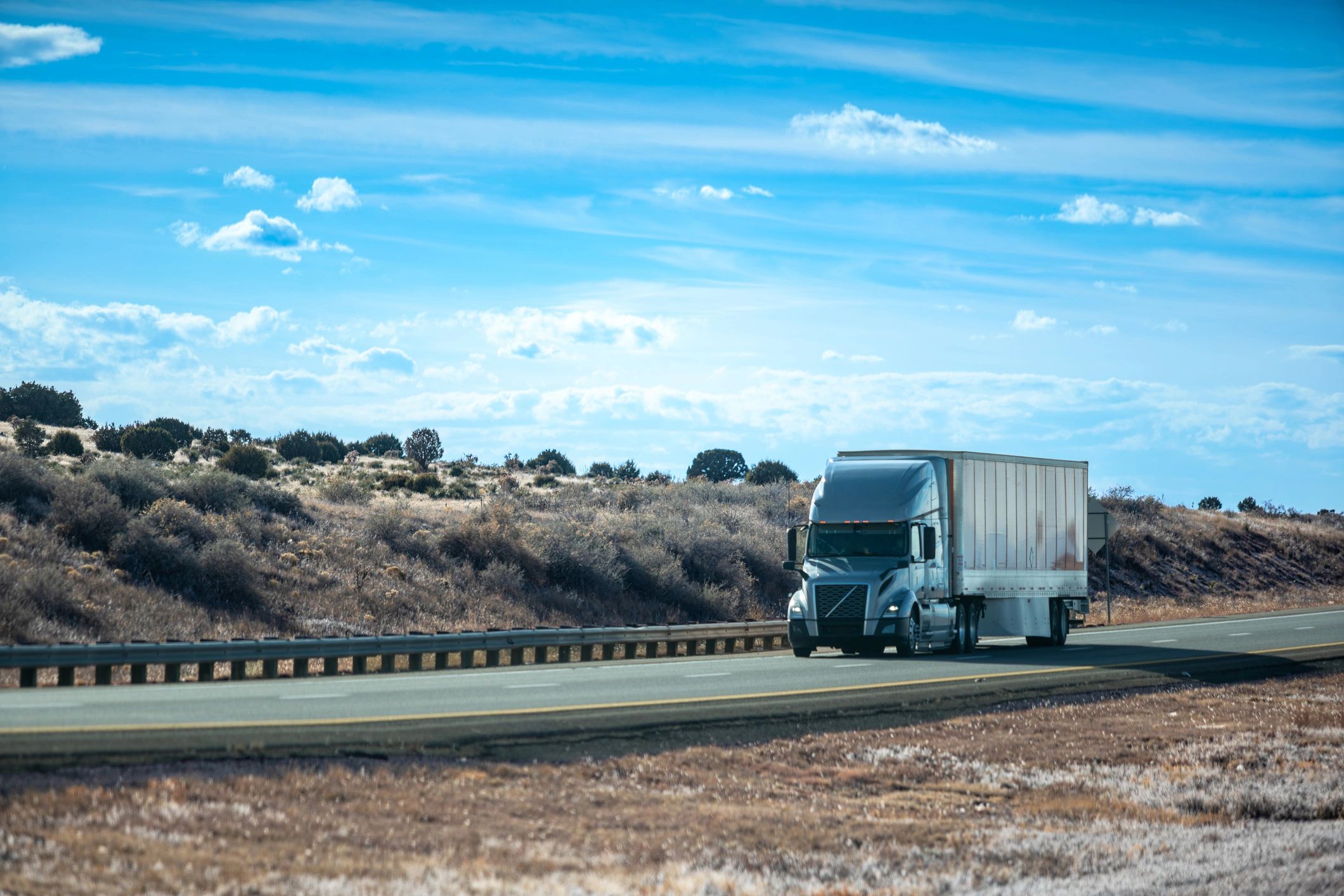 Refrigerated freight truck traveling on a highway